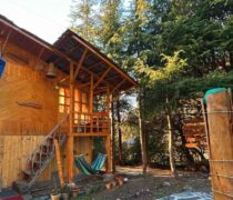 glass house cottage in Bir
